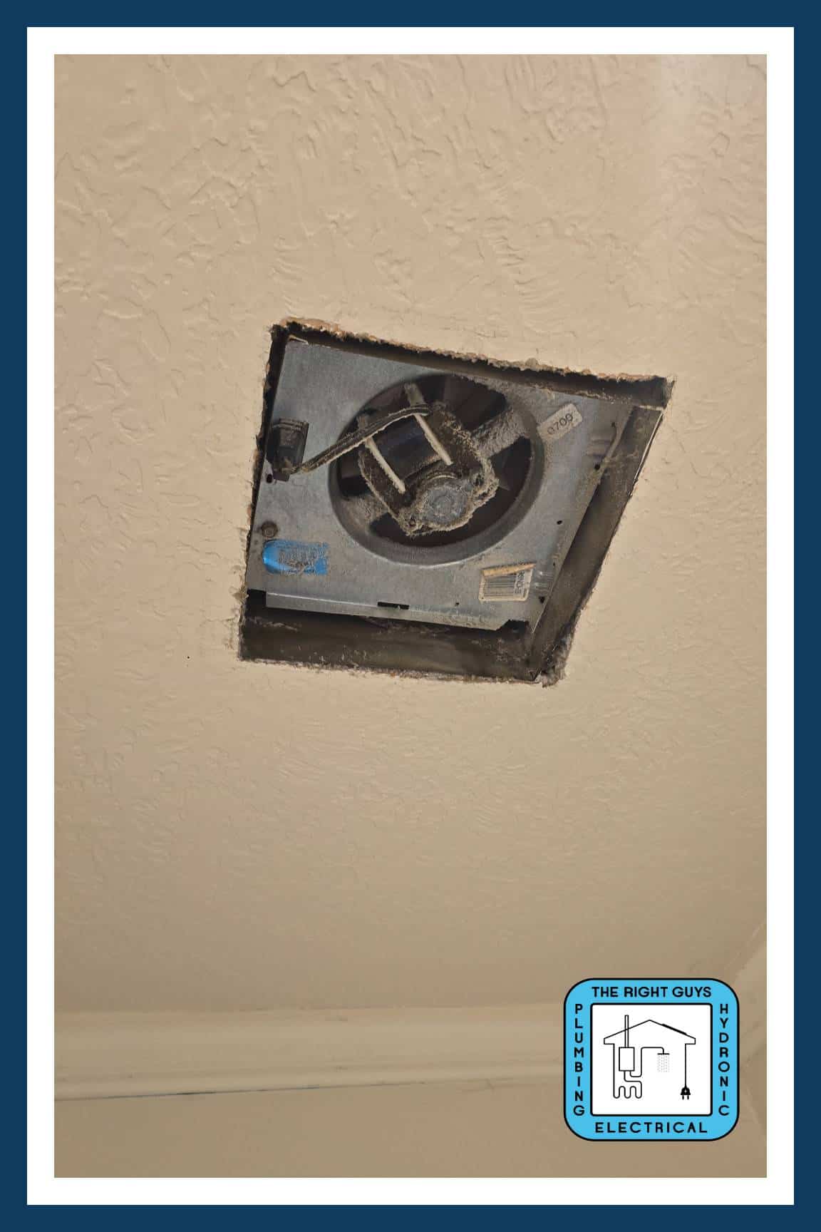Broken and dysfunctional old motor of the bathroom fan