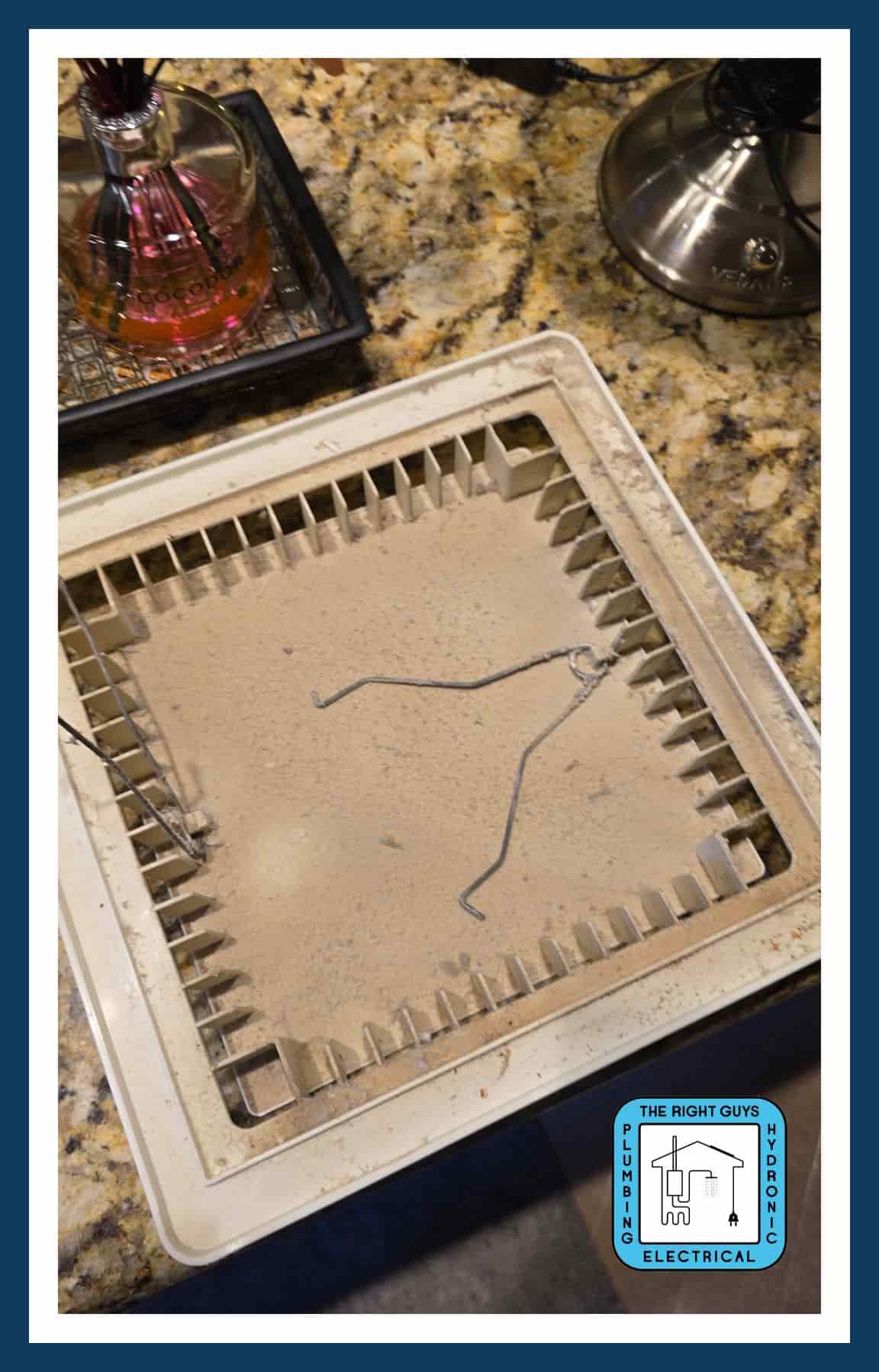Old broken bathroom exhaust fan